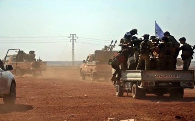 DAISê êrîsî milîsên Îranê kir: 2 kustî, 7 birîndar