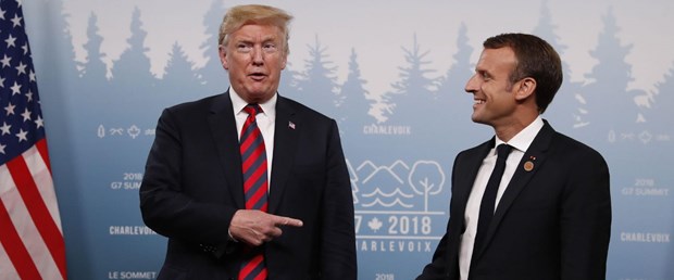 Trump ve Macron coronavirüs salginini görüstü
