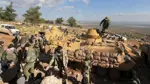 Efrîn: Çekdarên Emşatê ji gundekî kurdan derketin